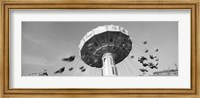 Framed Low angle view of people spinning on a carousel, Stuttgart, Baden-Wurttemberg, Germany