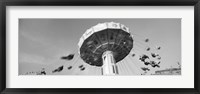 Framed Low angle view of people spinning on a carousel, Stuttgart, Baden-Wurttemberg, Germany