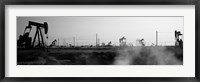 Framed Oil drills in a field, Maricopa, Kern County, California (black and white)