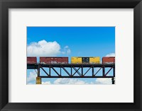 Framed Freight train passing over a bridge, Ontario, Canada