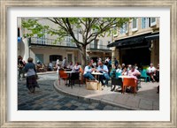 Framed Tourists at sidewalk cafes, Lourmarin, Vaucluse, Provence-Alpes-Cote d'Azur, France