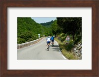 Framed Bicyclists on the road, Bonnieux, Vaucluse, Provence-Alpes-Cote d'Azur, France