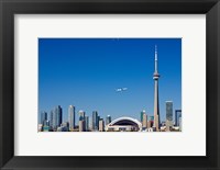 Framed Airplane over city skylines, CN Tower, Toronto, Ontario, Canada 2011