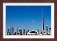 Framed Airplane over city skylines, CN Tower, Toronto, Ontario, Canada 2011