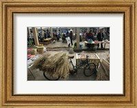 Framed Traditional town market with grass on bicycle for making brooms, Xizhou, Erhai Hu Lake Area, Yunnan Province, China