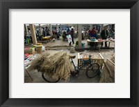 Framed Traditional town market with grass on bicycle for making brooms, Xizhou, Erhai Hu Lake Area, Yunnan Province, China