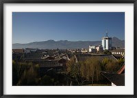 Framed High angle view of buildings in the new town viewed from Mu Family Mansion, Lijiang, Yunnan Province, China