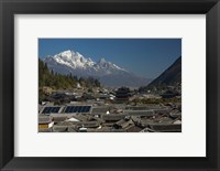 Framed High angle view of houses with Jade Dragon Snow Mountain in the background, Old Town, Lijiang, Yunnan Province, China