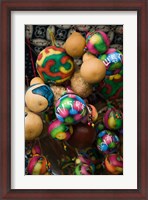 Framed Painted gourds for sale in a street market, Old Town, Lijiang, Yunnan Province, China