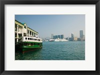 Framed Star ferry on a pier with buildings in the background, Central District, Hong Kong Island, Hong Kong