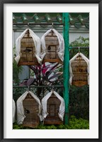 Framed Birds in cages for sale at a bird market, Yuen Po Street Bird Garden, Mong Kok, Kowloon, Hong Kong