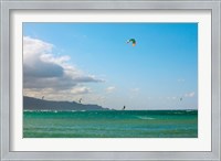 Framed Tourists kiteboarding in the ocean, Maui, Hawaii, USA