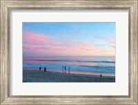 Framed Tourists on the beach at sunset, Santa Monica, California, USA