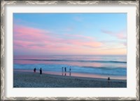 Framed Tourists on the beach at sunset, Santa Monica, California, USA