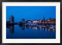 Framed Tour St-Nicholas and Tour de la Chaine towers at dawn, Old Port, La Rochelle, Charente-Maritime, Poitou-Charentes, France