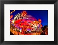 Framed Time exposure of a Carnival ride at night