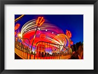 Framed Time exposure of a Carnival ride at night