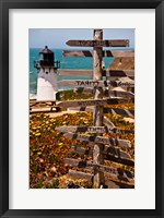 Framed Directional signs on a pole with light house in the background, Point Montara Lighthouse, Montara, California, USA