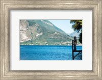 Framed Man Fishing from Dock on Edge of Lake Como, Varenna, Lombardy, Italy