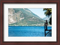 Framed Man Fishing from Dock on Edge of Lake Como, Varenna, Lombardy, Italy