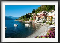 Framed Houses at waterfront with boats on Lake Como, Varenna, Lombardy, Italy