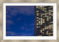 Framed Low angle view of a shopping centre with crescent moon at dusk, Marina Bay Sands, Singapore