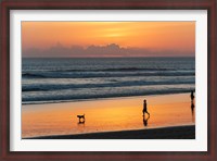 Framed Silhouette of people and dog walking on the beach, Seminyak, Kuta, Bali, Indonesia