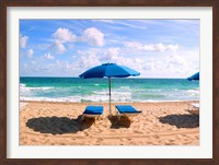 Framed Lounge chairs and beach umbrella on the beach, Fort Lauderdale Beach, Florida, USA