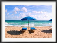 Framed Lounge chairs and beach umbrella on the beach, Fort Lauderdale Beach, Florida, USA