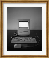 Framed Apple Macintosh Classic desktop PC (black and white)