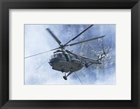 Framed Bulgarian Air Force Mi-17 helicopter over a forest fire in Bulgaria