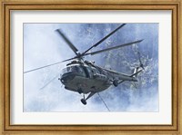 Framed Bulgarian Air Force Mi-17 helicopter over a forest fire in Bulgaria