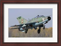 Framed Bulgarian Air Force MiG-21UM jet fighter taking off