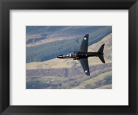 Framed Hawk T1 trainer aircraft of the Royal Air Force low flying over North Wales