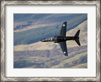 Framed Hawk T1 trainer aircraft of the Royal Air Force low flying over North Wales