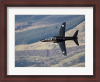 Framed Hawk T1 trainer aircraft of the Royal Air Force low flying over North Wales