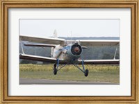 Framed Antonov An-2 taking off from an airfield in Bulgaria
