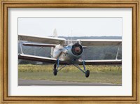 Framed Antonov An-2 taking off from an airfield in Bulgaria