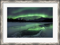 Framed Reflected aurora over a frozen Laksa Lake, Nordland, Norway
