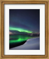 Framed Aurora Borealis over Vagsfjorden in Troms County, Norway
