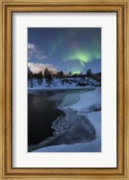 Framed Aurora Borealis over Tennevik River, Troms, Norway
