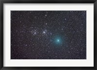 Framed Comet Hartley 2 as it approaches the Double Cluster in Perseus