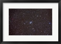 Framed Open cluster NGC 457 in the constellation Cassiopeia
