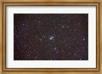 Framed Open cluster NGC 457 in the constellation Cassiopeia