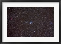 Framed Open cluster NGC 457 in the constellation Cassiopeia