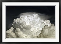 Framed Cumulus Congestus cloud with Pileus