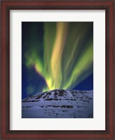 Framed Aurora Borealis over Toviktinden Mountain in Troms County, Norway