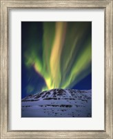 Framed Aurora Borealis over Toviktinden Mountain in Troms County, Norway