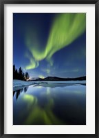 Framed Aurora Borealis over Sandvannet Lake in Troms County, Norway