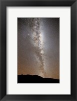Framed Milky Way in vertical position rising from the horizon